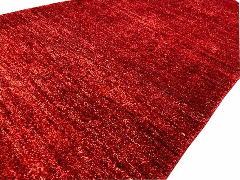 Red Gabbeh rug, 171x82 cm, close-up, dense mottled pile