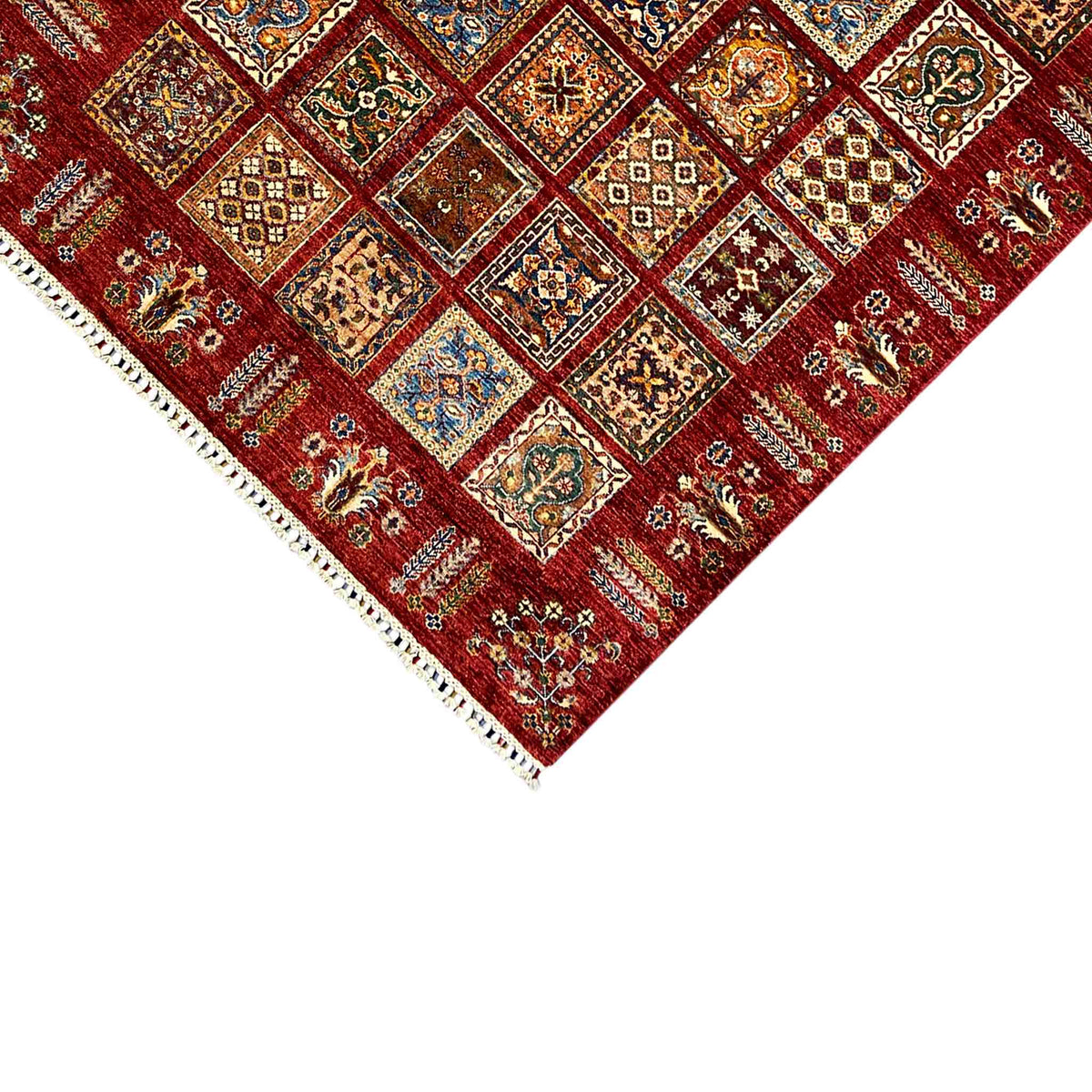 Red carpet: corner area with ornamental squares and a white fringed edge