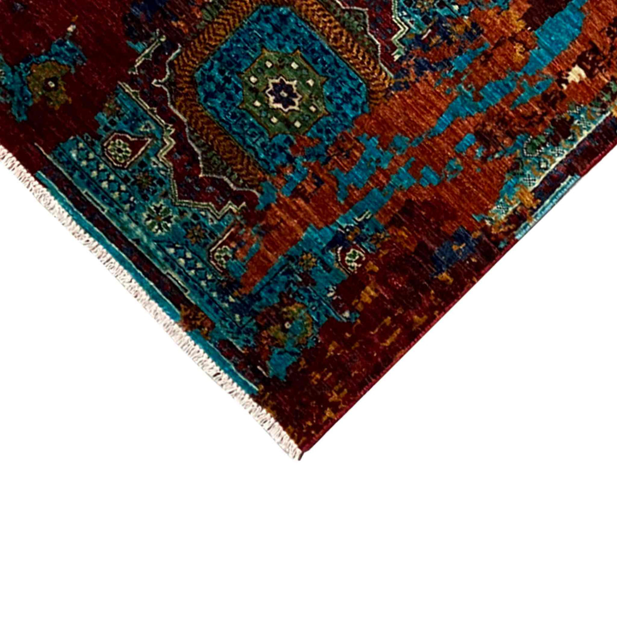 Corner of a runner rug with a turquoise ornamental field and colorful border, dense material