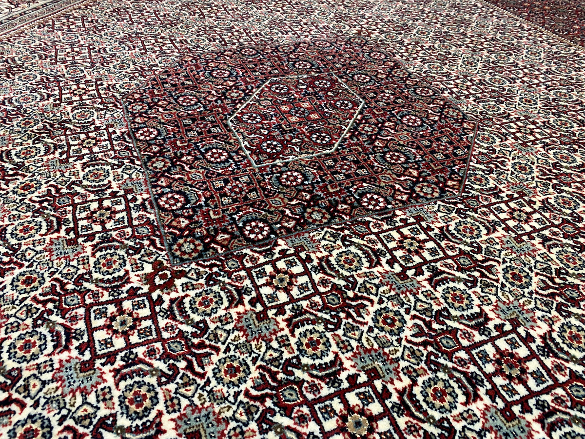 Bidjar rug: dense small-scale pattern with ornaments, predominantly dark red and cream-colored