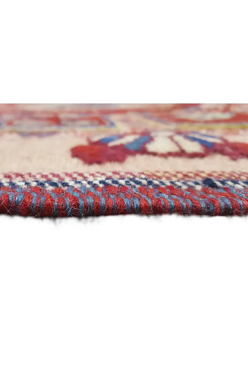 Soumak rug edge with braided fringe finish and patterned border