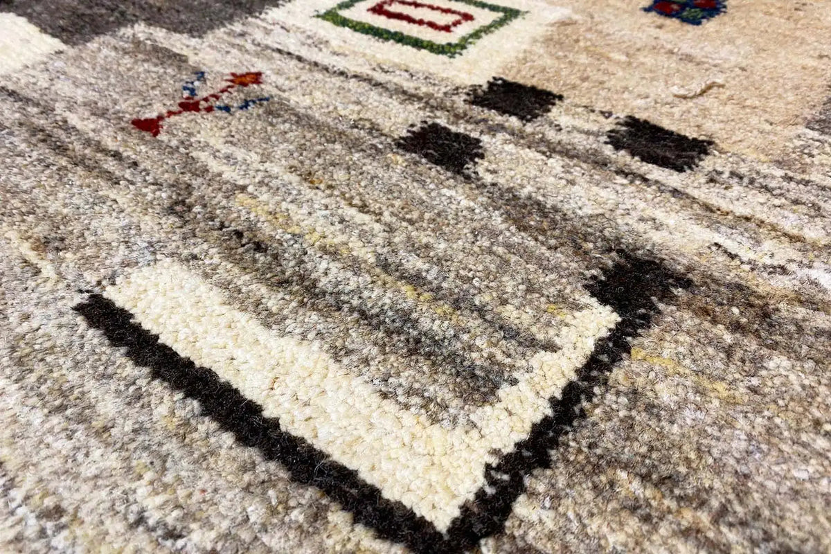 Gabbeh rug 198x146 cm, close-up with light beige-gray and dark pattern