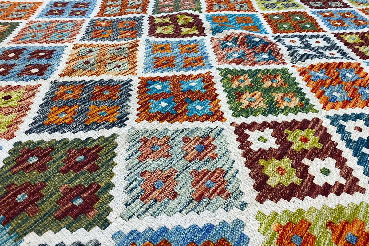 Kilim rug 198×147 cm with colorful geometric patterns, close-up