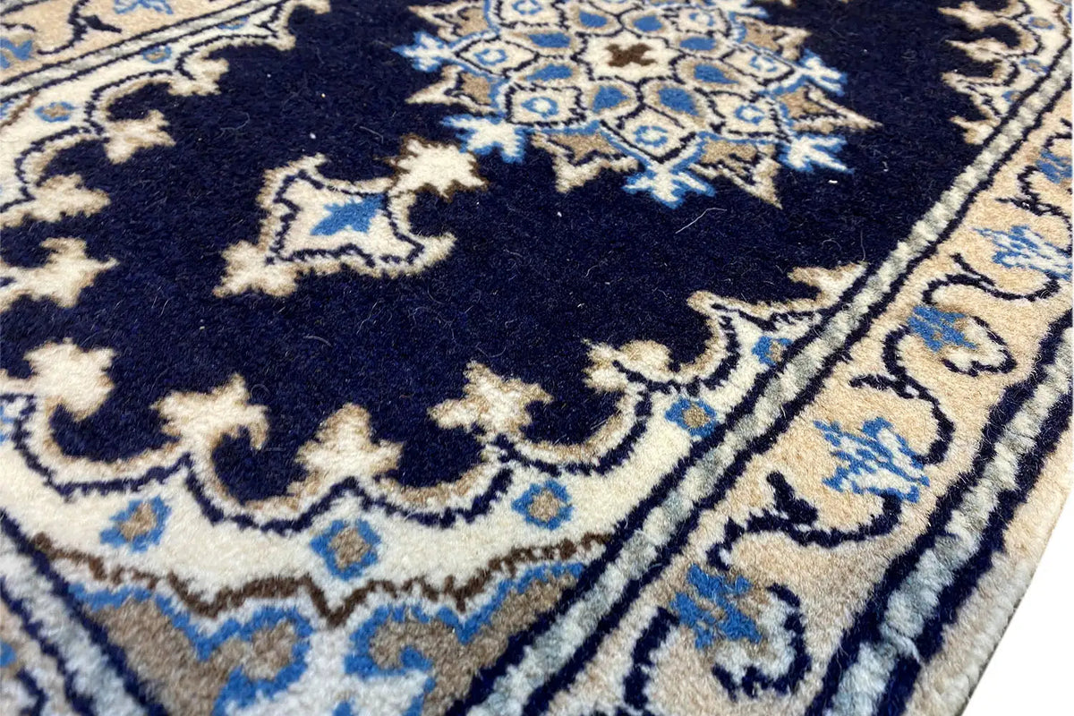 Nain rug 64x39 cm, detail of the ornamental pattern in dark blue and light blue