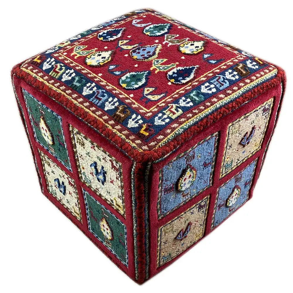 Square rug with a red top and multicolored side panels, animal motifs in an ornamental style