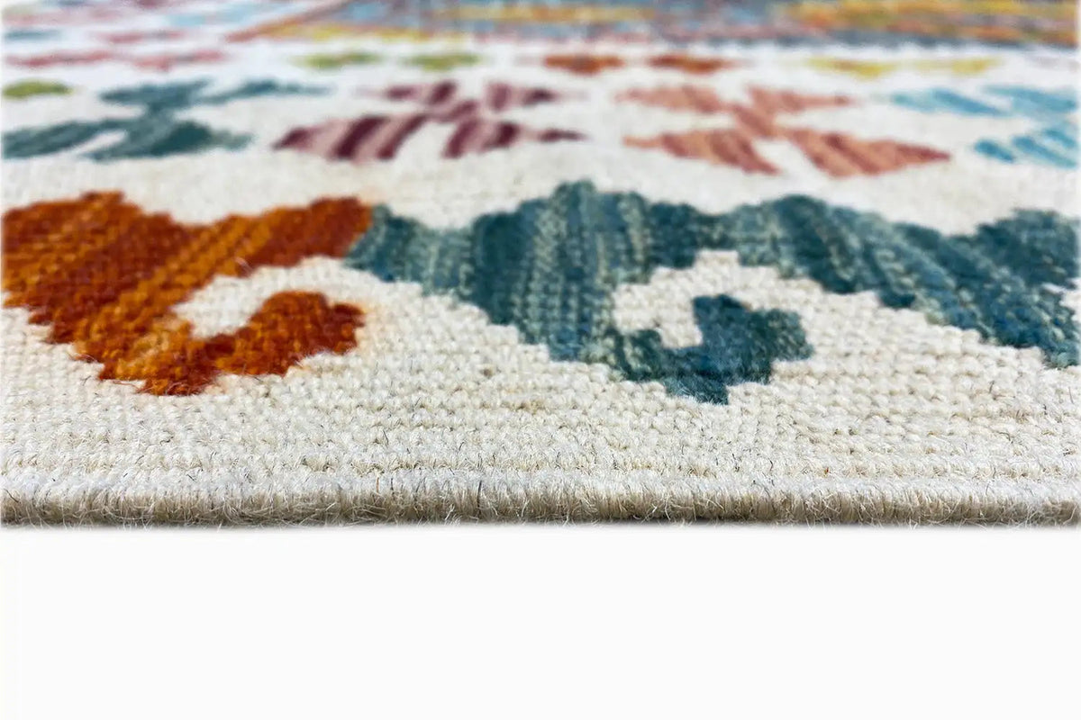 Afghan kilim 200x148 cm with colorful patterns and a visible selvedge, close-up