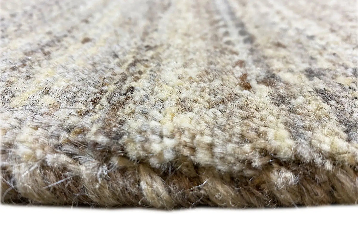 Gabbeh rug with dense short pile and visible fringe/edge fibers