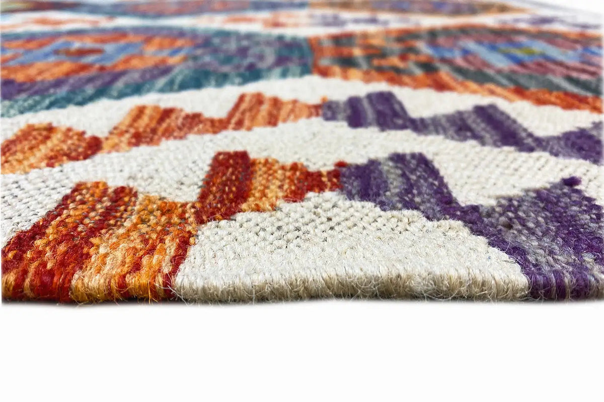 Afghan kilim rug with colorful ornaments, fringes, and a cropped edge