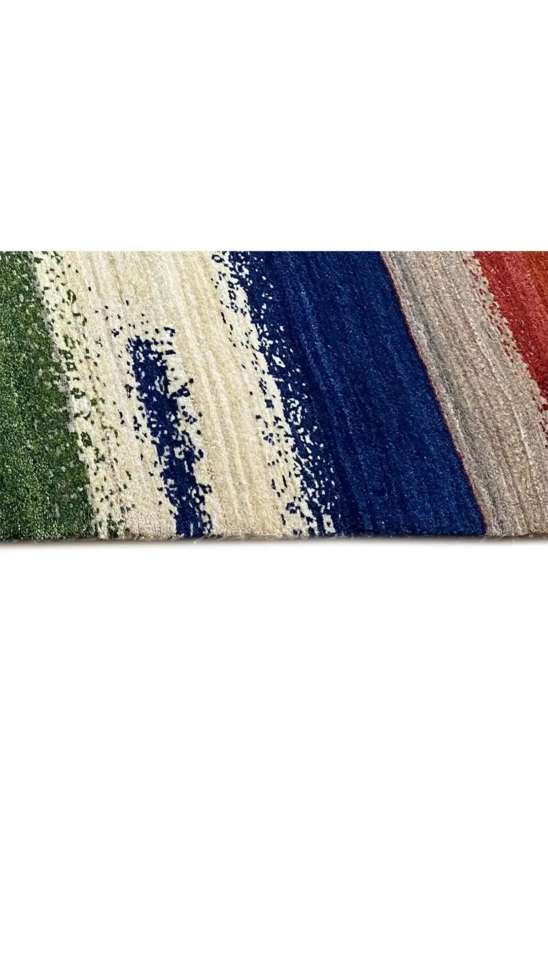 Gabbeh rug (198x150 cm) detail view: blocks of color in green, blue, red, and beige