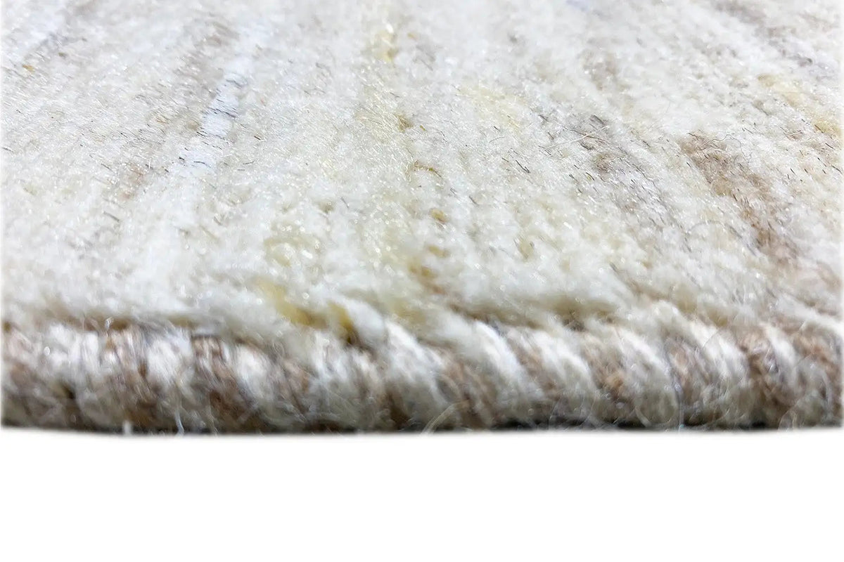 Gabbeh rug with a dense, light pile and a slightly brown shaded border