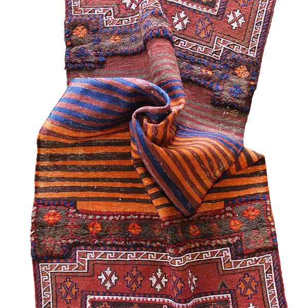 Bakhtiari kilim (238 x 90 cm) with a patterned border and striped design, folded in a colorful manner
