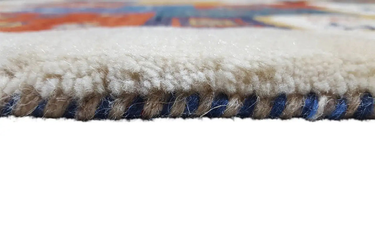 Gabbeh rug hem with fringe, light edge and blue border