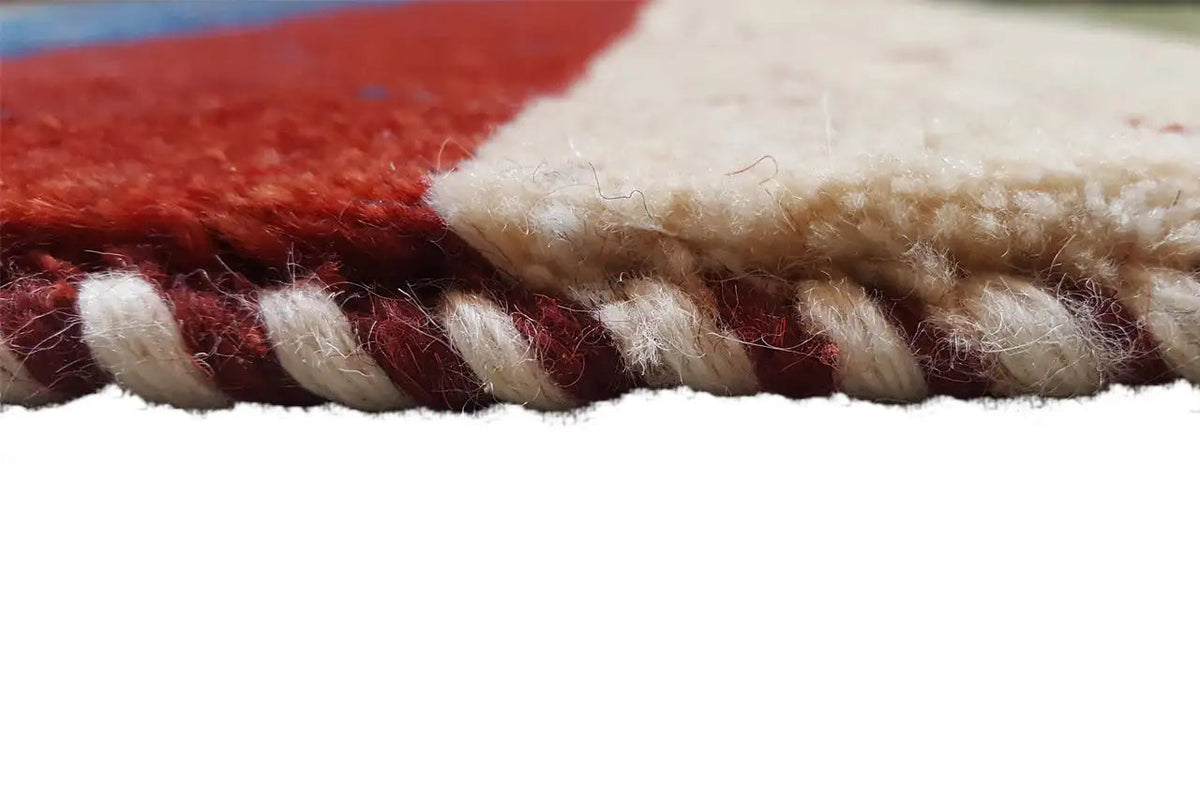 Gabbeh rug 200×148 cm close-up: pile and fringes at the edge