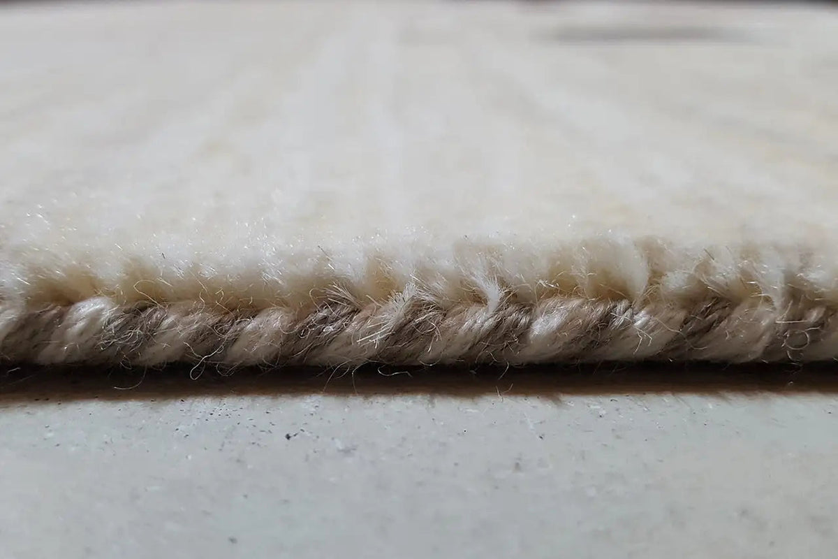 Gabbeh-Lori rug edge detail: dense pile, smooth finished edge