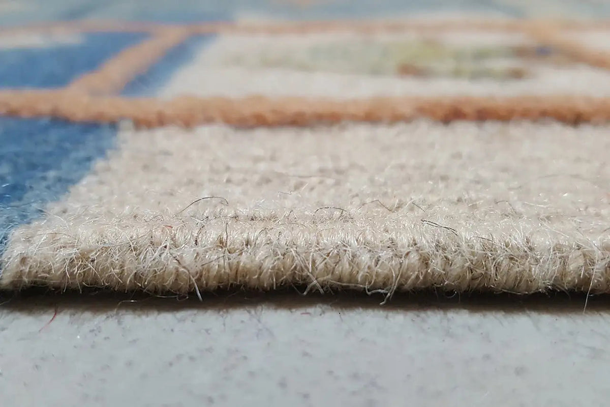 Detail at the edge: finished fringe and a sturdy selvedge on the blue kilim