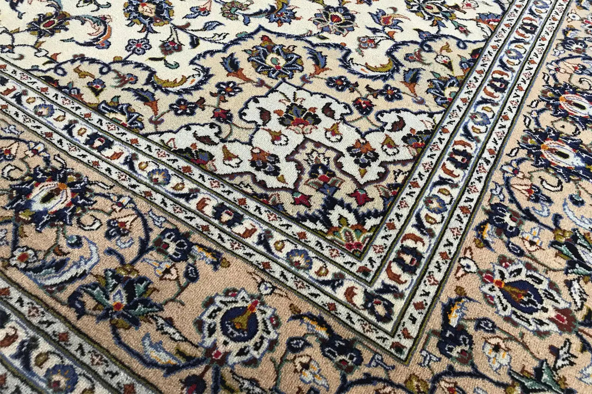 Carpet pattern with stepped borders and small floral motifs, diagonal view
