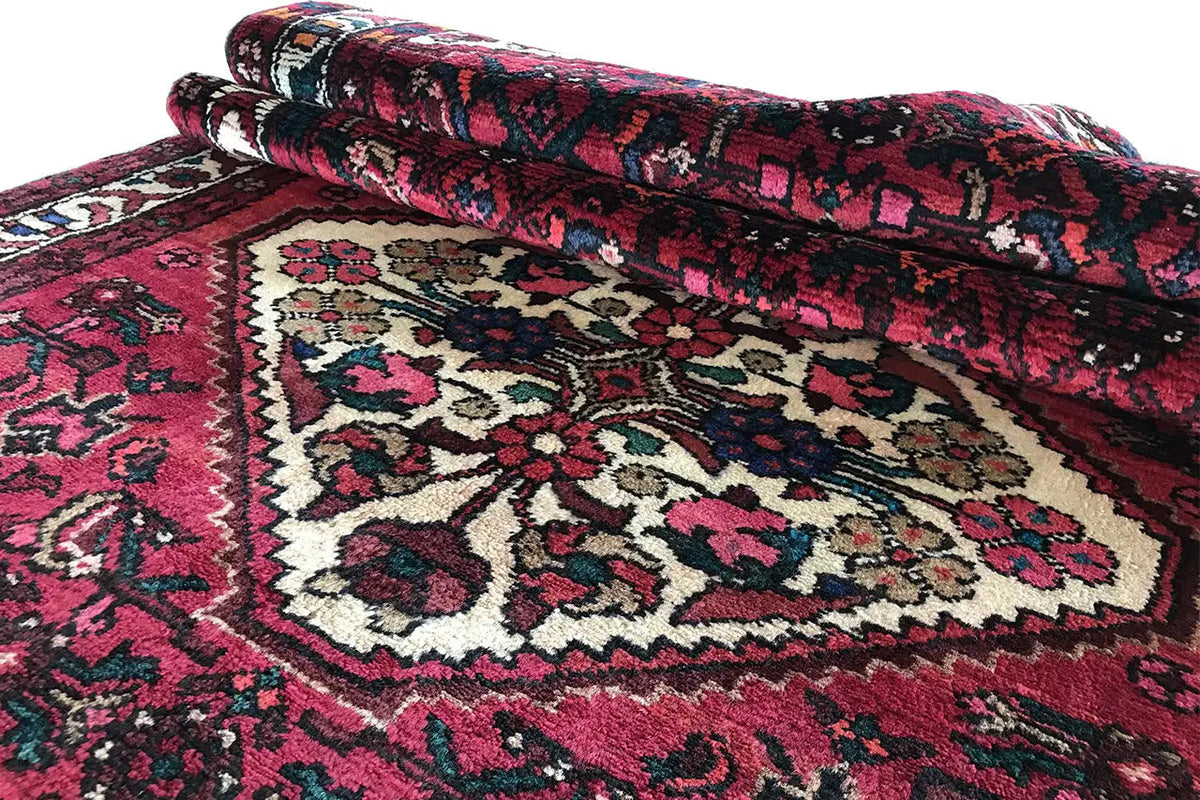 Curled Hamadan runner, red pattern with white medallion, multicolored border
