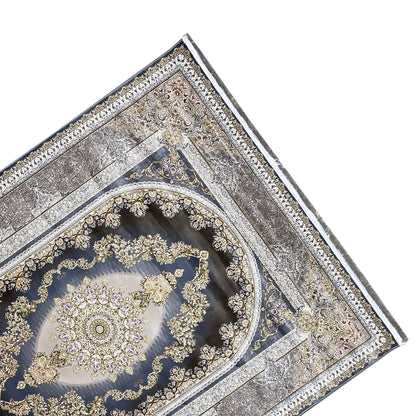 Rug at an angle: dark blue medallion, gold embellishments, surrounding borders.