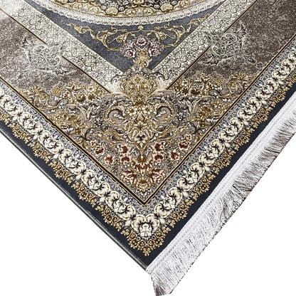 Dark blue carpet with an elaborate border ornament and decorative fringe at the corner