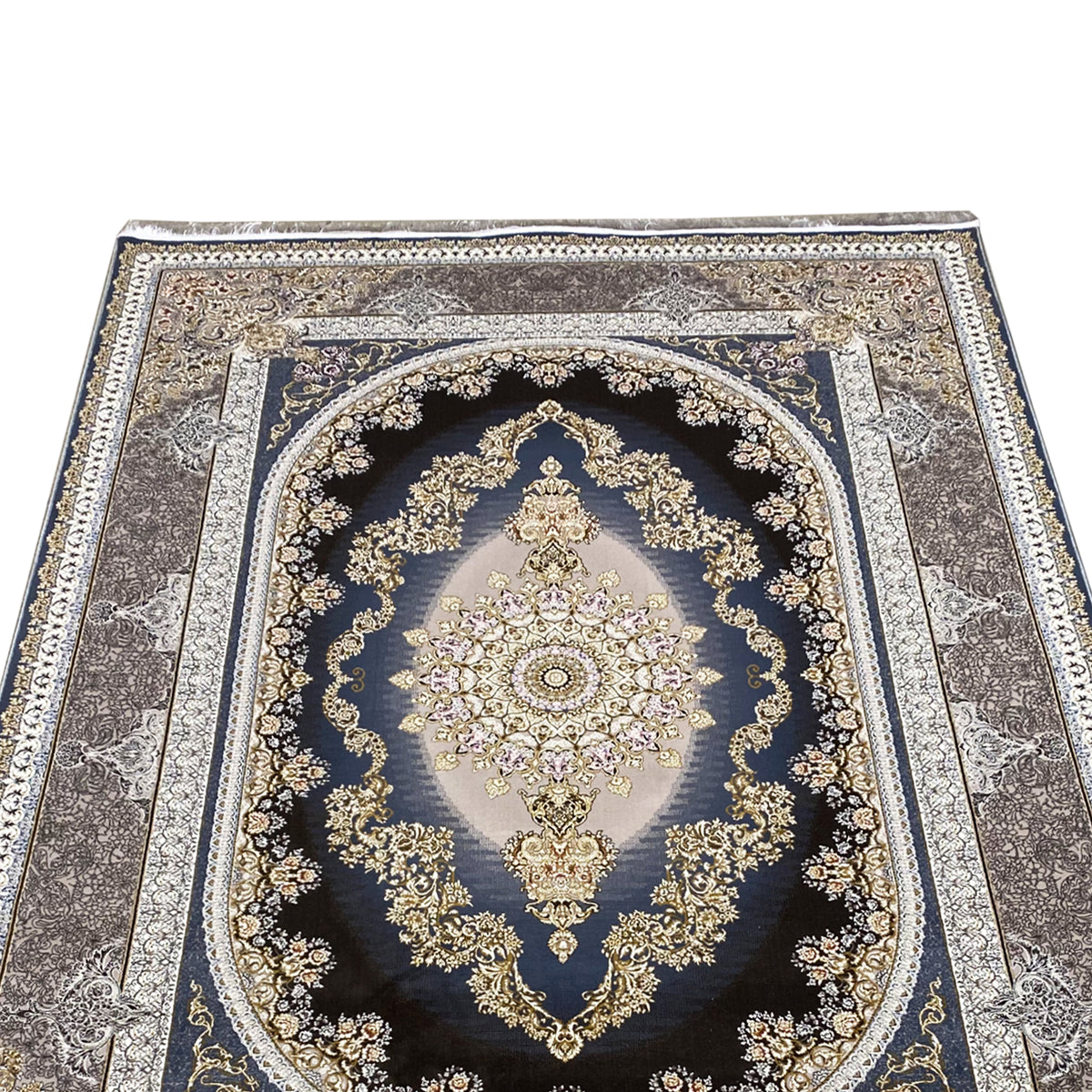 Detailed view of the carpet medallion: golden floral ornaments on a dark blue background.
