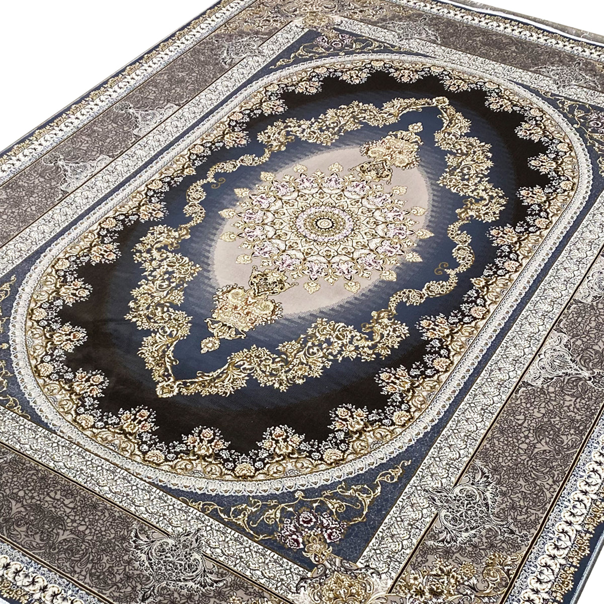 Close-up of the carpet: golden ornamental chain around the medallion on a dark blue background.