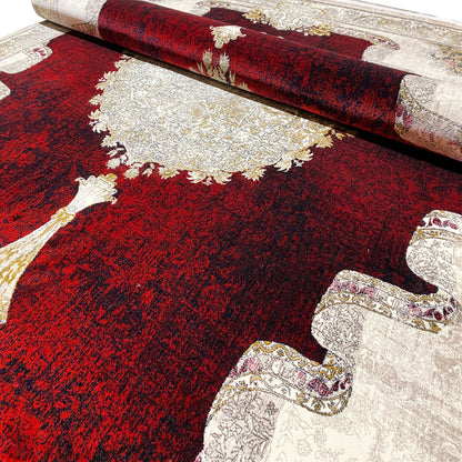 Burgundy-red carpet with woven patterns and silver relief, detail at the edge