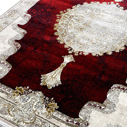 Rug 170x240 cm, detail: red pile with a white-and-gold medallion and gold decorative elements.