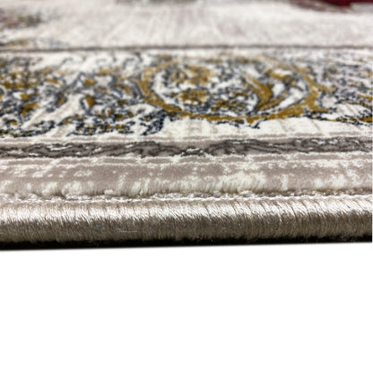 Rug 170x240 cm, border detail: silver pile with gold ornaments and fringed edge.