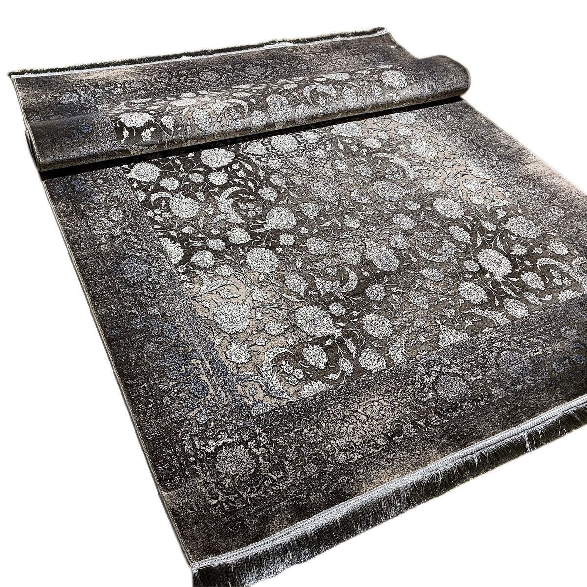 Moonflower rug 170x240 cm, side view with an integrated pattern, dark border, fringes