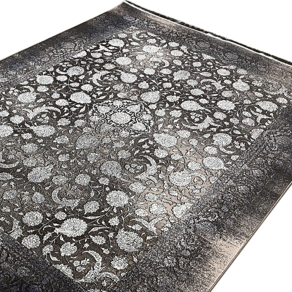 Moonflower rug 170x240 cm, close-up: dense floral pattern in gray and cream, woven look