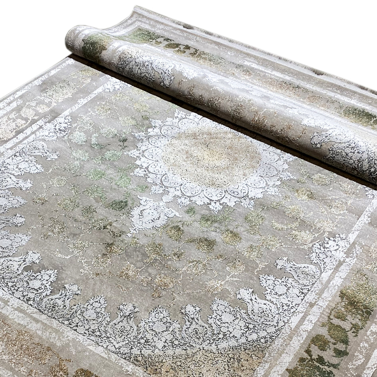 Rectangular rug with a rolled edge, silver damask ornaments, and a green pattern