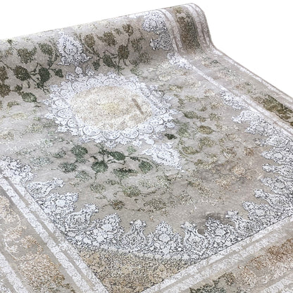 Rectangular rug with a white-silver floral center and greenish-shaded elements