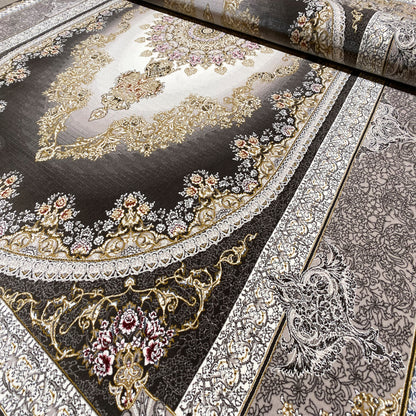 Smoke-gray rug with a round medallion, floral details, and silver borders