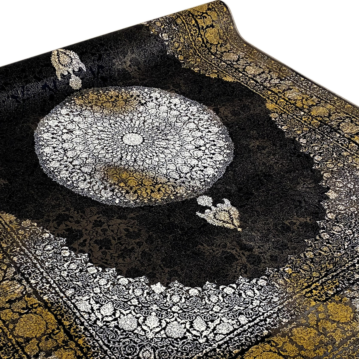 Rug with a black cosmic pattern, a silver circular area, and gold-colored decorative bands