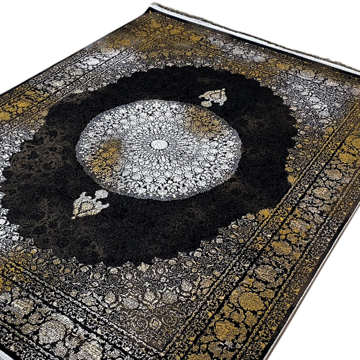 Close-up of an Oriental rug: round medallion with delicate silver patterns, gold accents