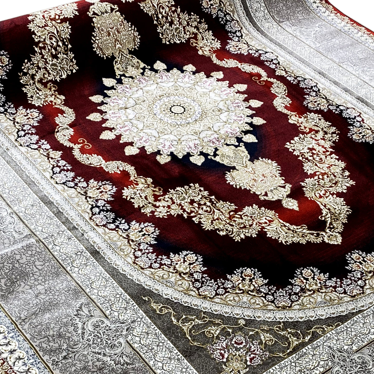 Oriental rug with a red medallion, a large ornament, and a silver side border