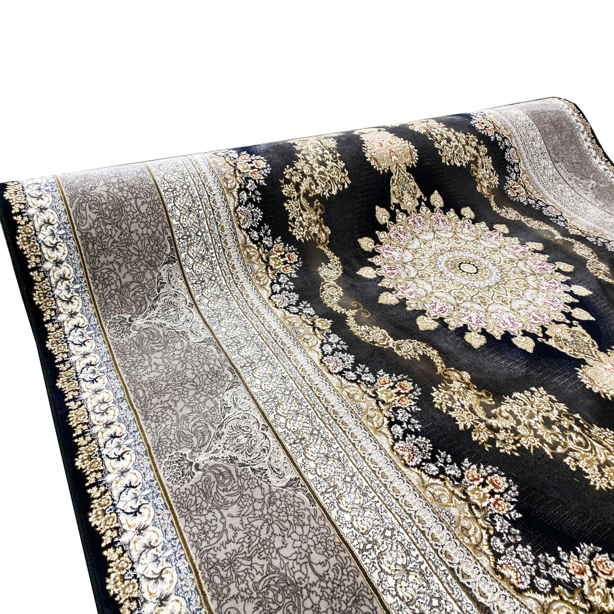 Rug detail: dark pile with a silver medallion, gold ornaments, and a border trim