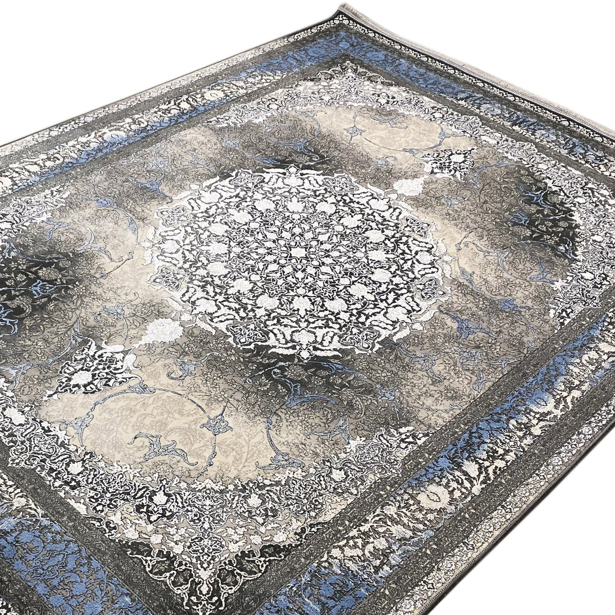 Rug 170x240 cm close-up: ornate center, blue-gray border edge