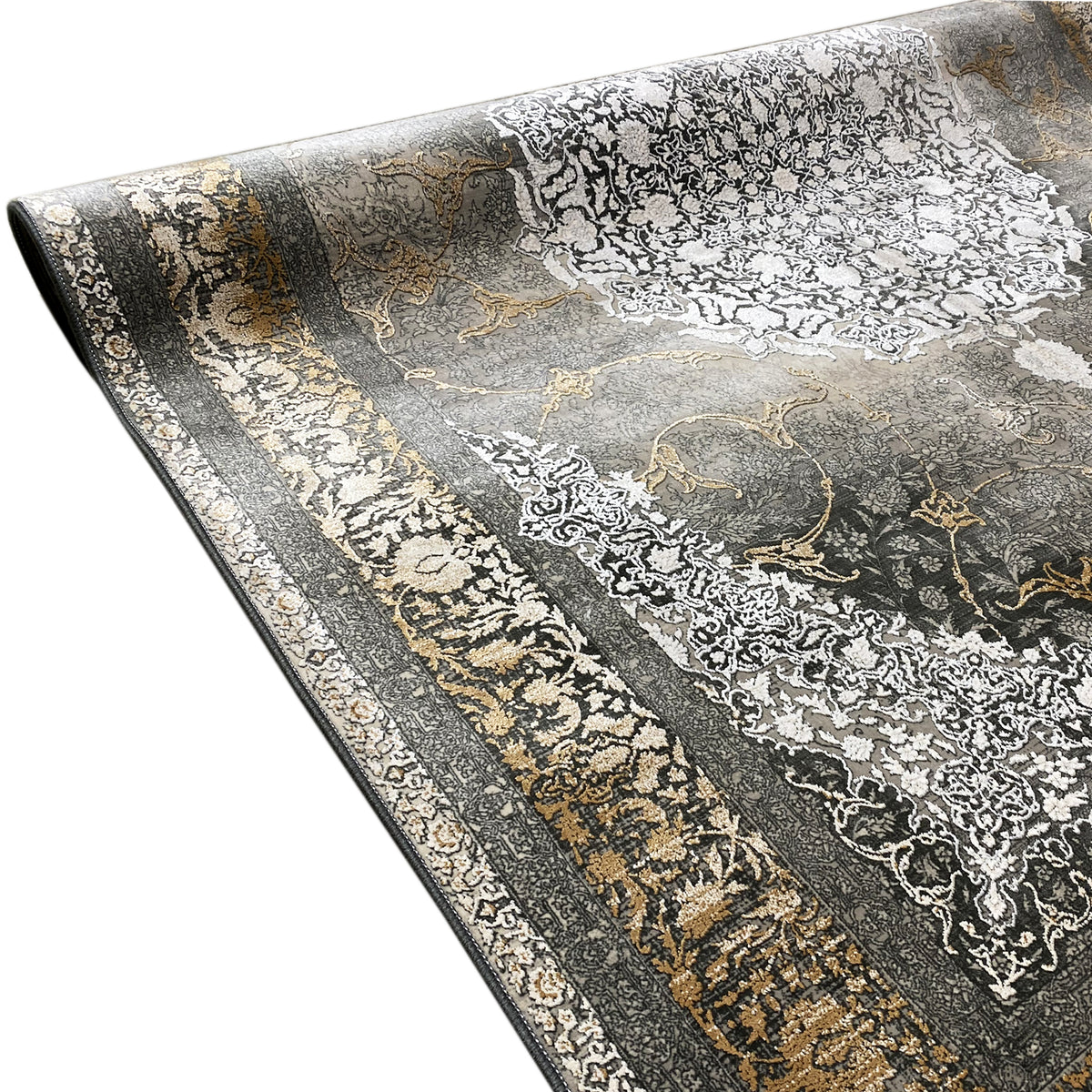 Rug border with a broad gold pattern on smoky brown and dense white ornamentation