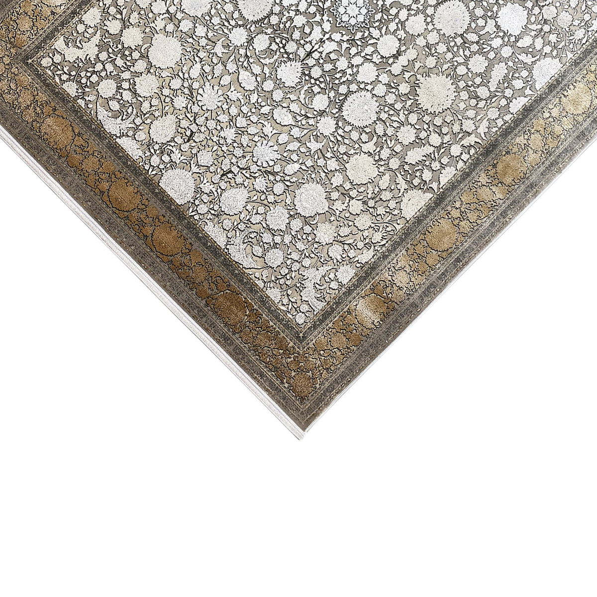 Silver-gold carpet with decorative border and dense floral pattern, close-up corner