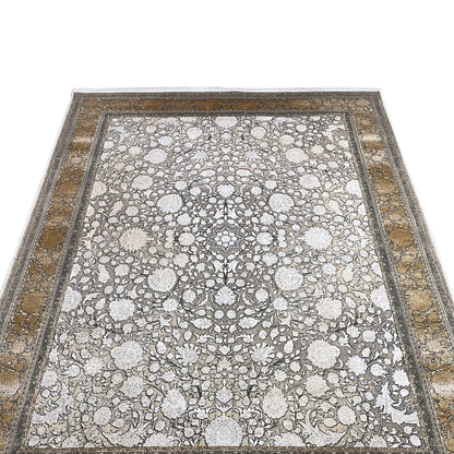 Silver-gold rug with a large-scale floral pattern and decorative borders