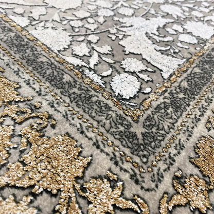 Close-up: silver-gray carpet with gold-colored embellishments and white floral motifs