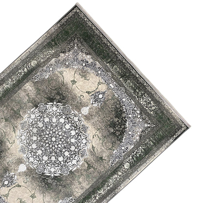 Forest Spirit rug 170x240 cm with diagonal view: dark green border, cream patterned areas