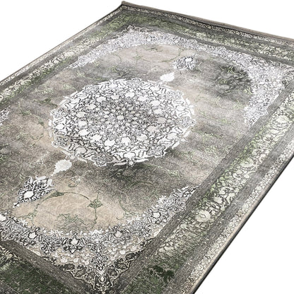 Forest Spirit rug 170x240 cm close-up at an angle: delicate cream patterns, dark green border