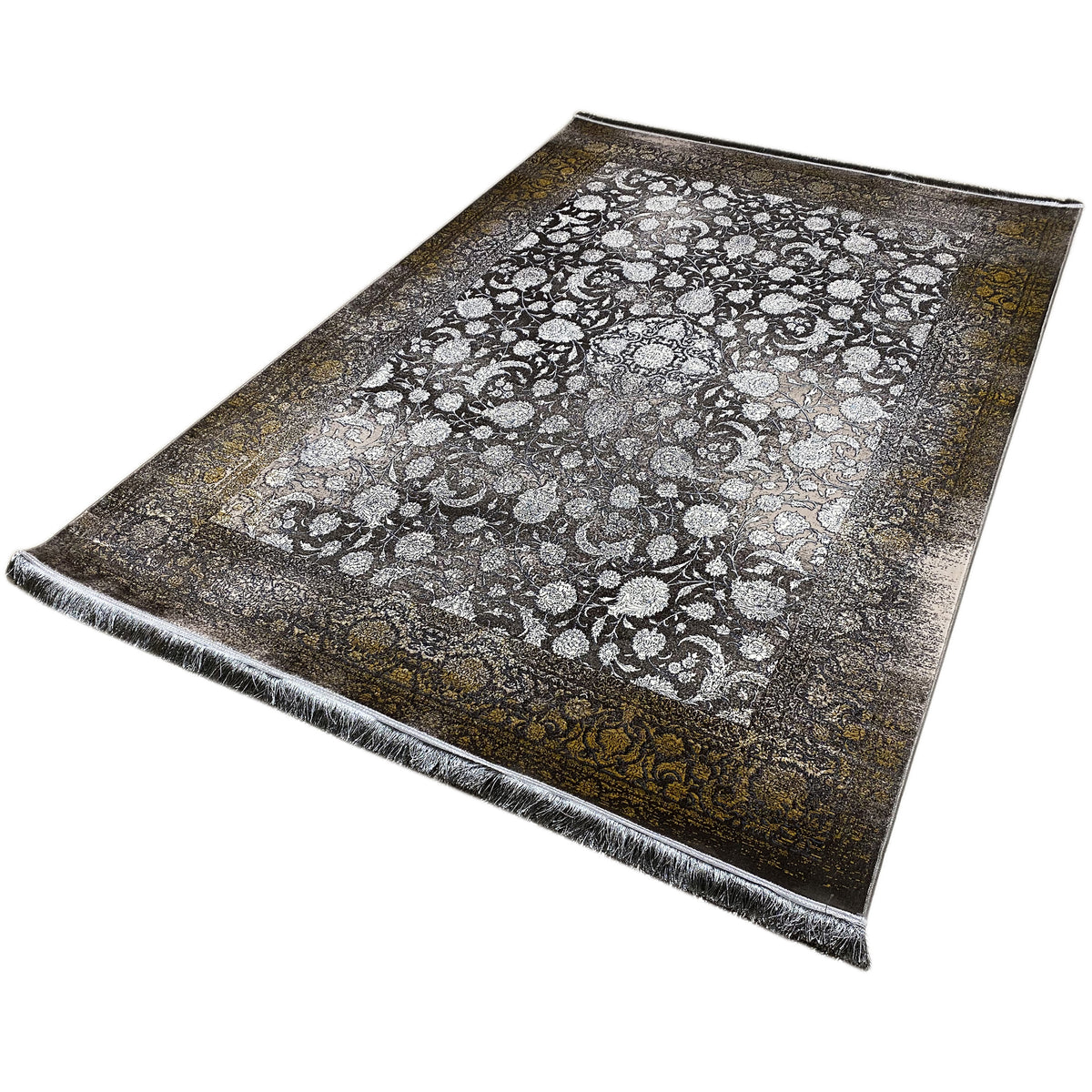 Rug “Eternal Autumn” 170x240 cm, lying at an angle with fringes and a golden-brown border along the side
