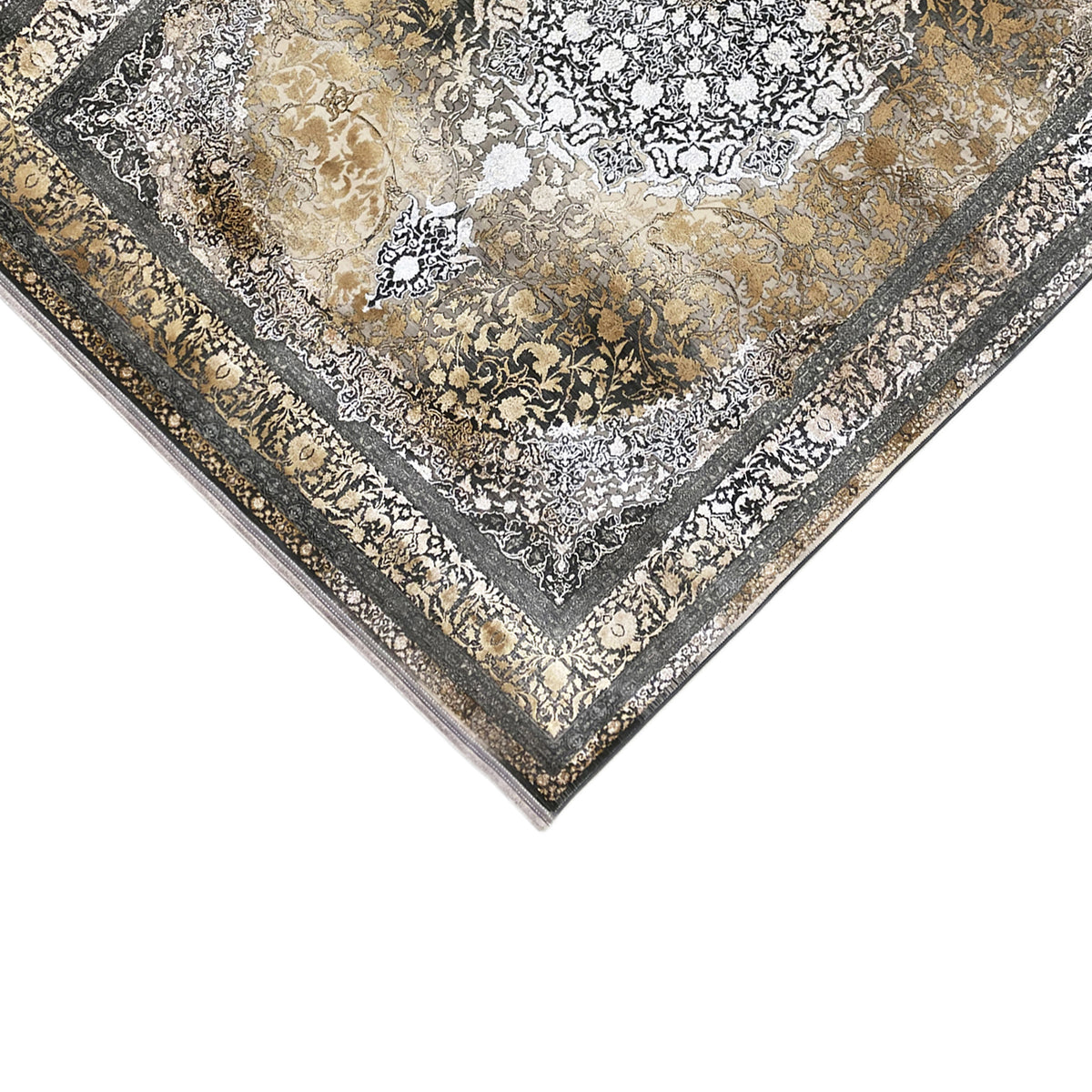 Rectangular rug laid out: high-contrast ornamental pattern in gold, silver, and dark gray.