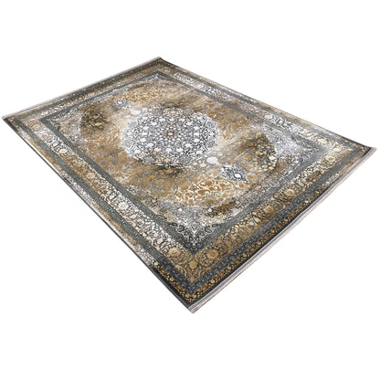 Rectangular rug with a central ornamental motif and dark outer border in gold/silver.