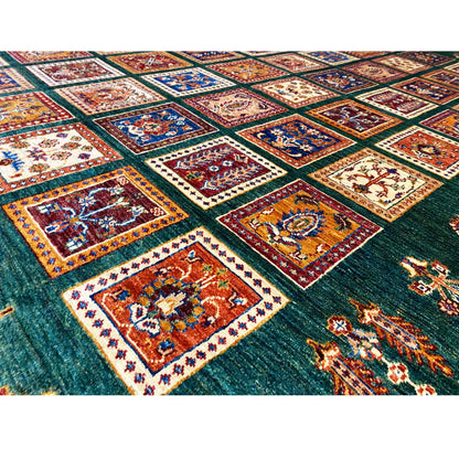 Close-up: Khorjin rug with colorful squares, inlaid ornamental motifs, and a green background