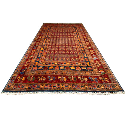 Reddish-brown rug with a geometric pattern, surrounding border, and fringes