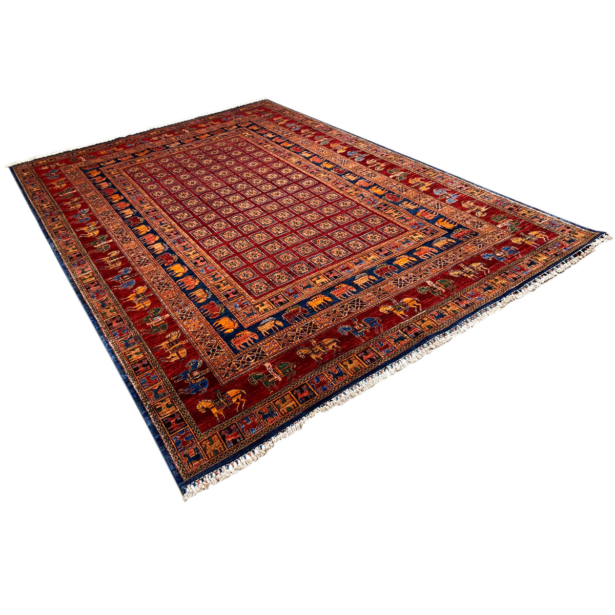 Reddish-brown rug in three-quarter view with a dense diamond and border pattern